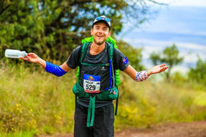 Ultra runner and Kusaga Athletic athlete Phil Dernee smiling during the Mauna to Mauna multi day race event in Hawaii 